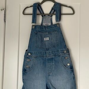 Levi’s women’s vintage shortalls in light indigo worn in